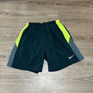 Nike running shorts, built in pro combat sliders underneath - dark charcoal grey